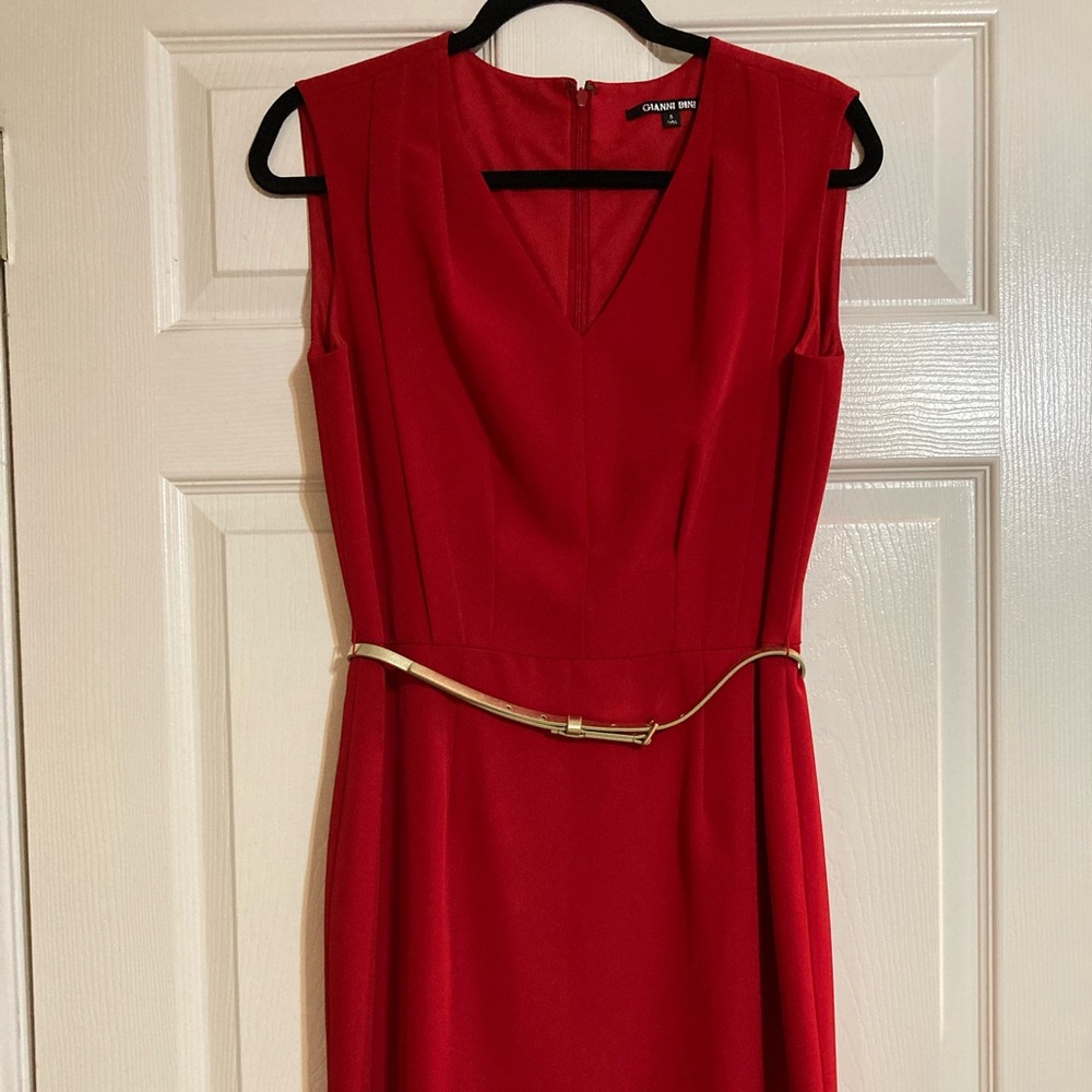 Red sleeveless shift dress with gold skinny belt